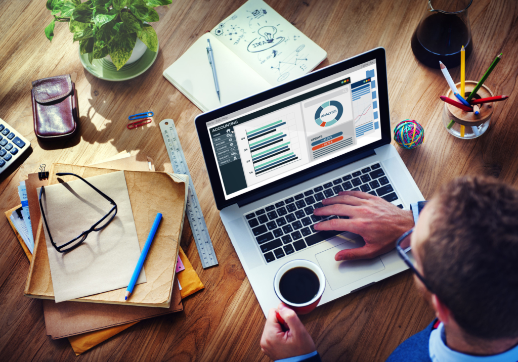 photo of man at computer doing website analysis