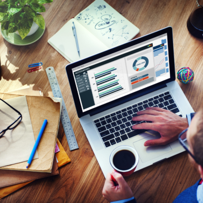 photo of man at computer doing website analysis