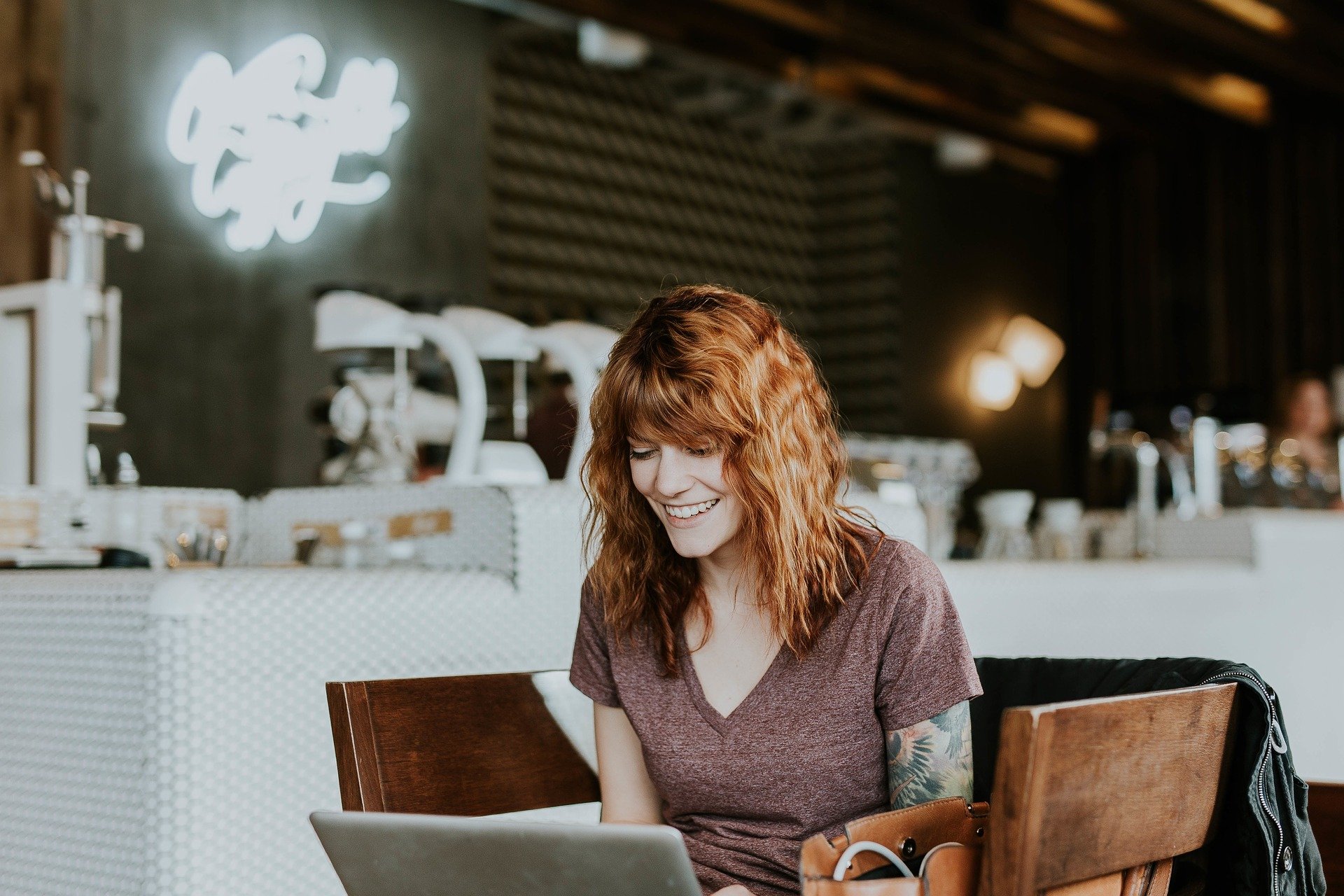 photo of girl on laptop using her website as a marketing tool