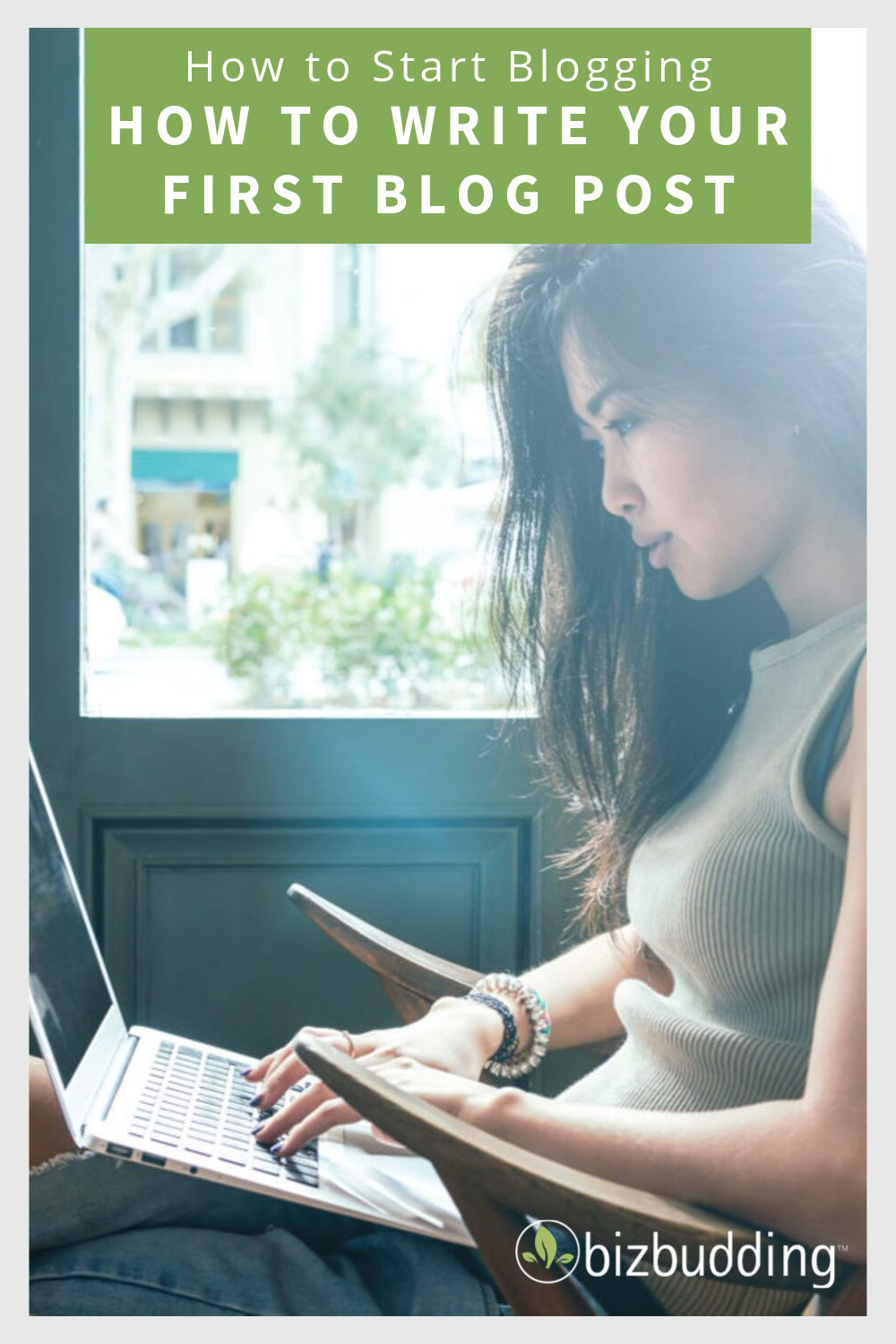 Woman typing at laptop