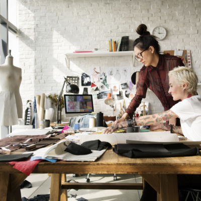 fashion designers at table