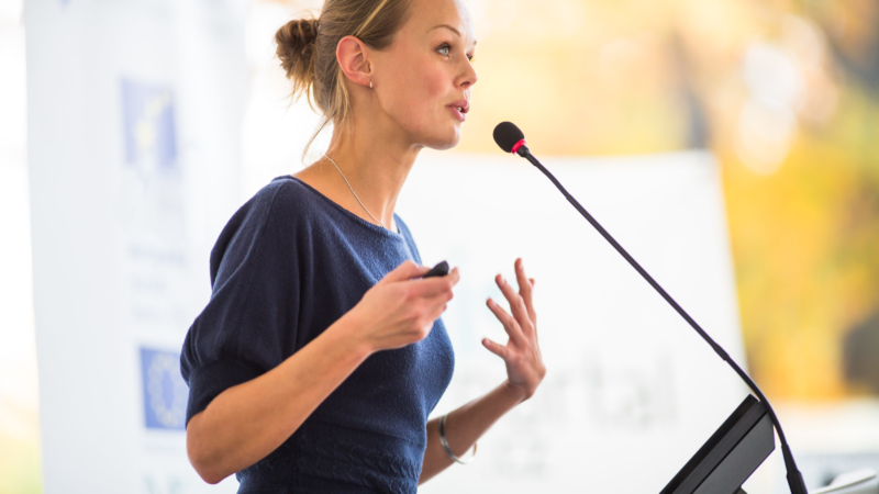 photo of woman public speaking