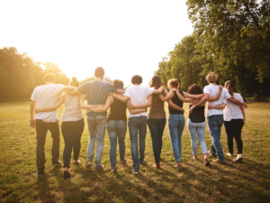 image of people standing together as a community