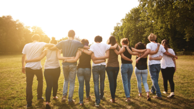 image of people standing together as a community