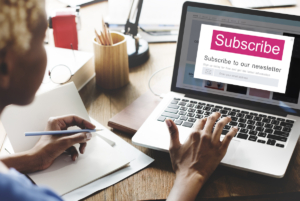 Woman subscribing to a blog newsletter