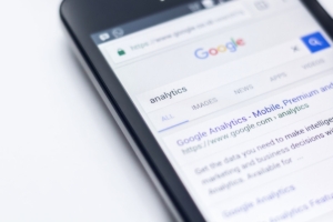 smartphone showing Google site and the world analytics in the search bar