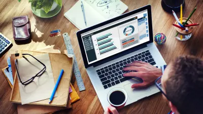 photo of man at computer doing website analysis