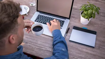 man working on laptop