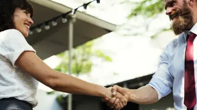 photo of people shaking hands, becoming affiliates