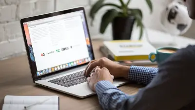 photo of man using a laptop to find out what is a landing page