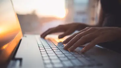 Image of Hands Typing on Keyboard
