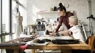 fashion designers at table