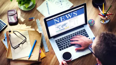 image of news website on laptop