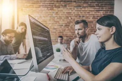 Developing programming and coding technologies. Website design. Programmer working in a software develop company office.