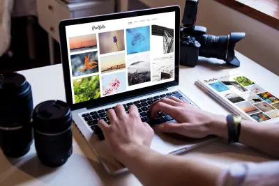 Photographer managing his online portfolio
