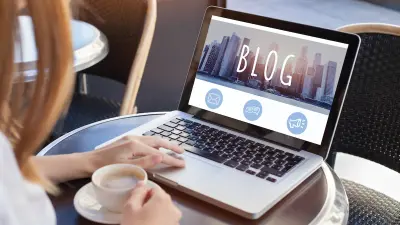 woman looking at blog archive on computer screen