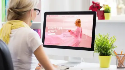 Woman Creating Her Own Website On Computer