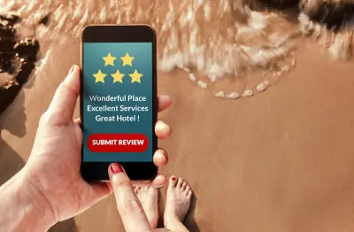 person leaving a positive travel review on a cell phone