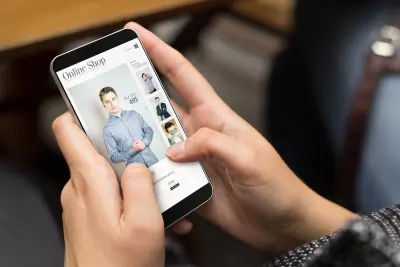 e-commerce concept: girl using a digital generated phone with shop online on the screen